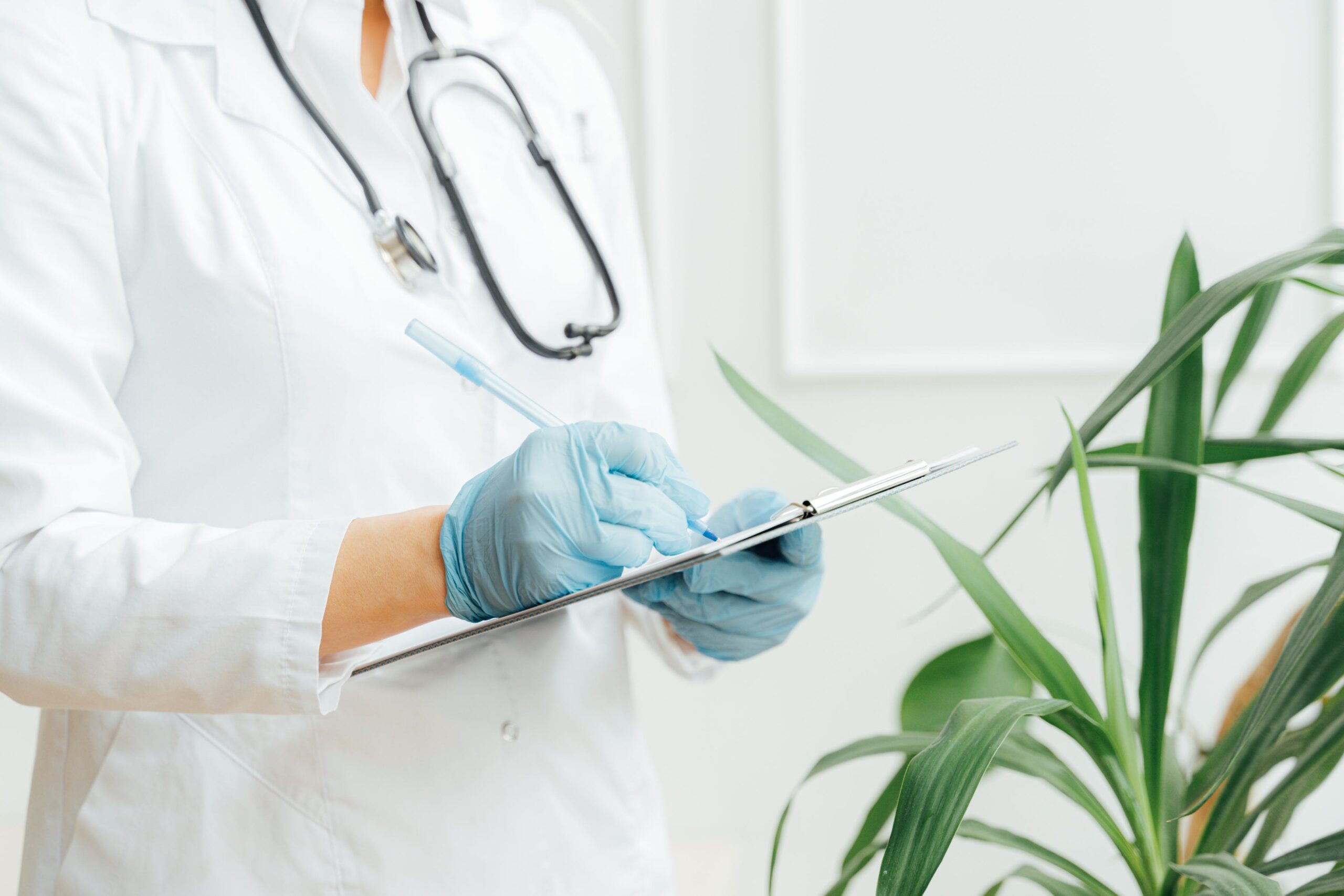 Nurse checking clipboard