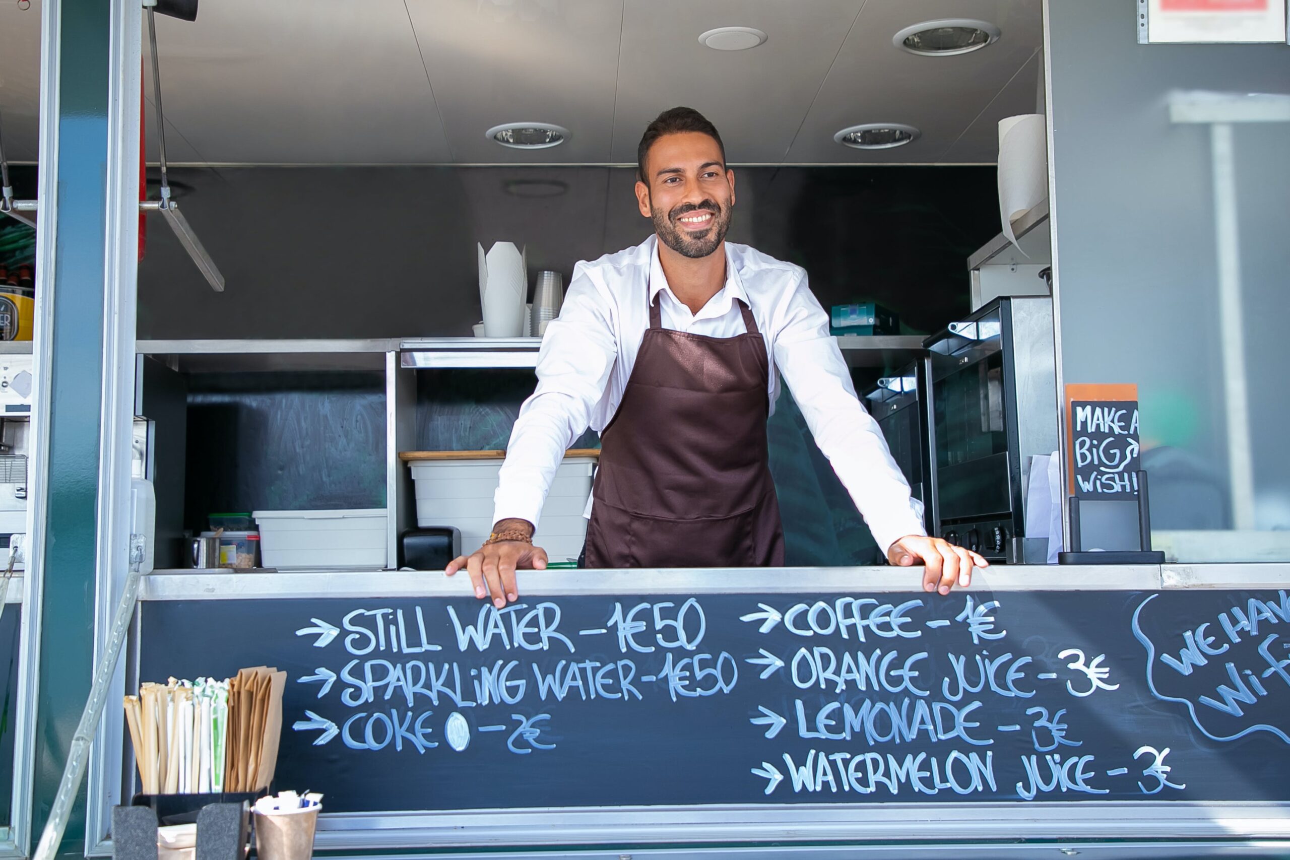 Person working at a food truck