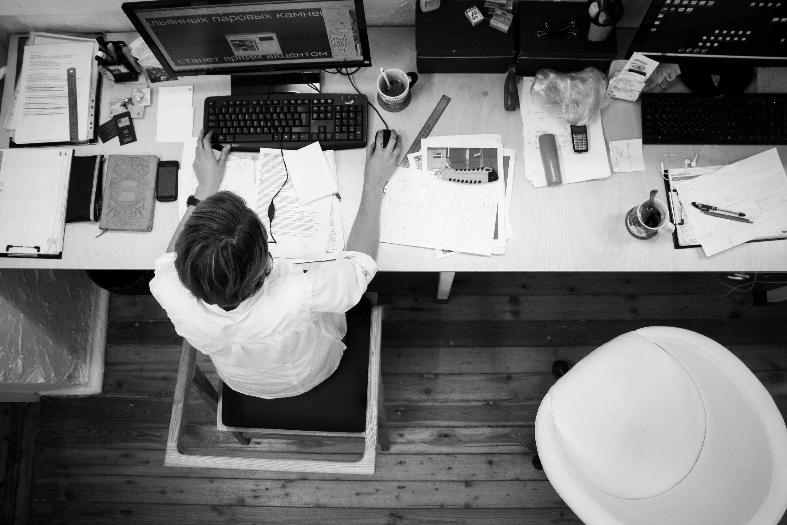Man working at a desk on his computer